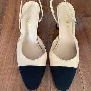 CHANEL nude leather black grosgrain toe cap